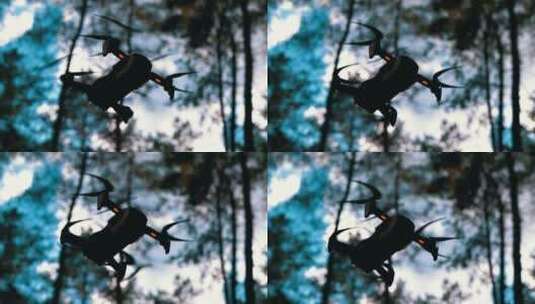 无人驾驶飞机在树林中盘旋的俯视图高清在线视频素材下载