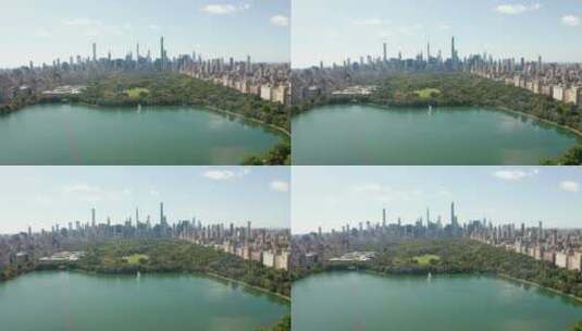 鸟瞰城市阳光明媚的中央公园湖高清在线视频素材下载