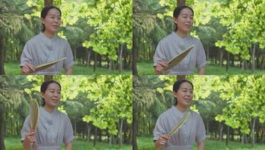 中国人女性公园乘凉避暑玩耍高清在线视频素材下载
