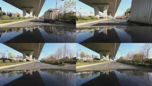 汽车行驶在高架桥下地面道路高清在线视频素材下载