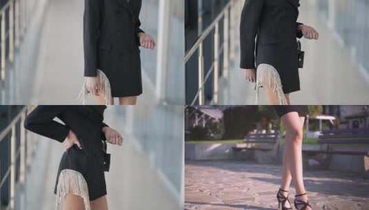 穿着高跟鞋在城市里散步的女商人高清在线视频素材下载