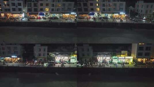 广西涠洲岛 南湾老街 店铺 游客 夜景 海岸高清在线视频素材下载