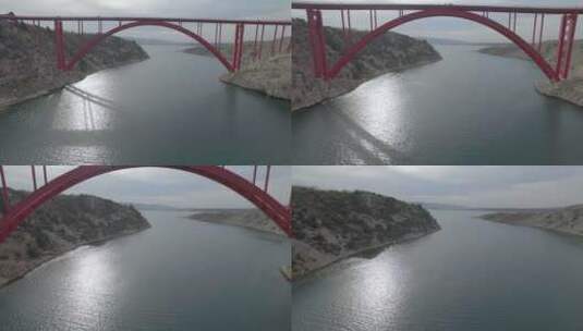 克罗地亚马斯莱尼察桥。乔治的红色钢桥。马斯莱尼察海峡的景色。无人机射击高清在线视频素材下载