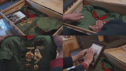 收藏箱子里牺牲的战友老照片老军装荣誉勋章高清在线视频素材下载