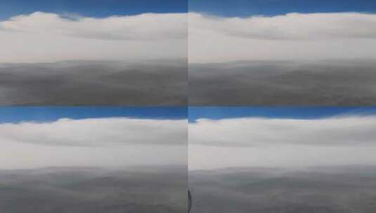 飞机窗外的云海山峦高清在线视频素材下载