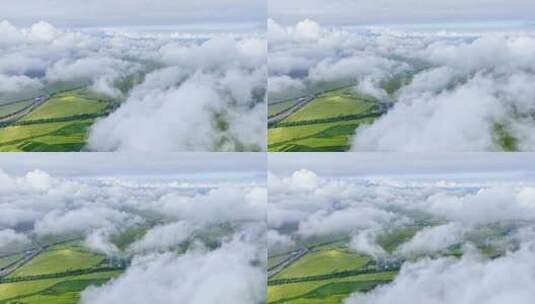 航拍云层下的田野高清在线视频素材下载