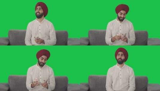 快乐的锡克教印度人数钱绿屏高清在线视频素材下载