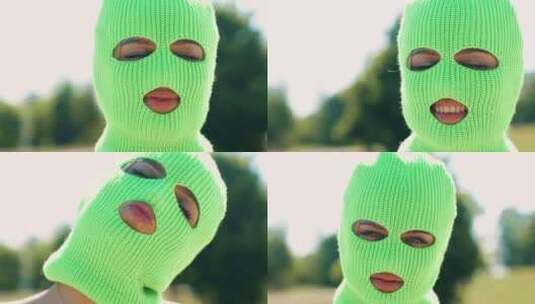 模特戴着强盗巴拉克拉法帽面具高清在线视频素材下载
