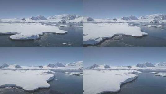 南极洲海岸线，海洋上空的空中飞行高清在线视频素材下载