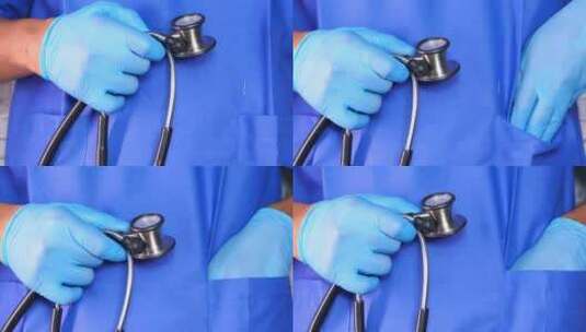 医生戴着防护手套手持听诊器高清在线视频素材下载