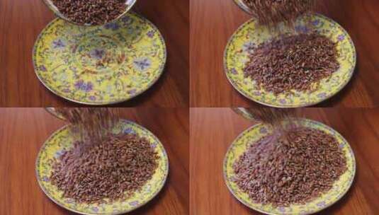 红米倒在盘子里 五谷杂粮 食材展示高清在线视频素材下载