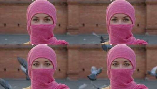 女人，穆斯林，看着相机，粉色高清在线视频素材下载