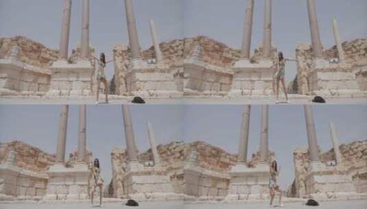 女孩在古建筑旁边跳舞高清在线视频素材下载