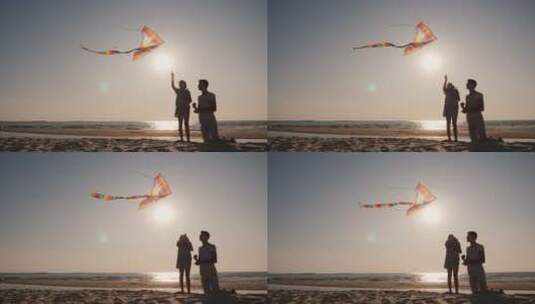 男人带着小孩在海边放风筝高清在线视频素材下载