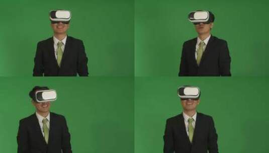 绿幕背景前男人戴着VR眼镜讲话高清在线视频素材下载
