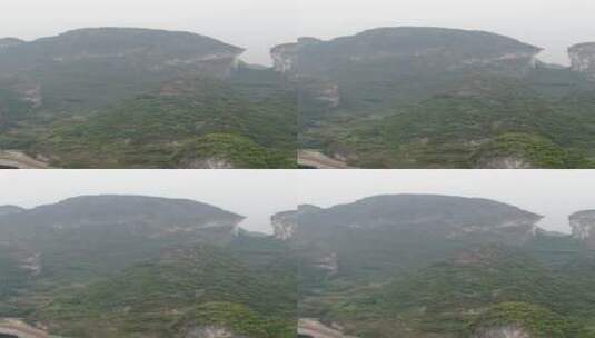 广西桂林哈斯特奇山山峰竖屏航拍高清在线视频素材下载