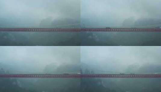 航拍雨天货车行驶在矮寨大桥上高清在线视频素材下载