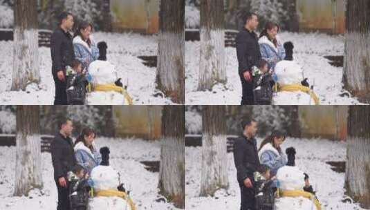 幸福一家四口和雪人拍照合影高清在线视频素材下载