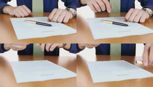 男子拿钢笔签约高清在线视频素材下载