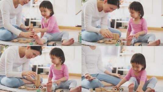 儿童和妈妈一起玩耍做地板上搭积木亲子陪伴高清在线视频素材下载