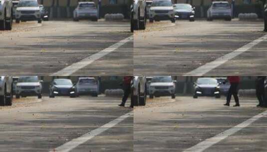 路面上的落叶和行人车辆高清在线视频素材下载