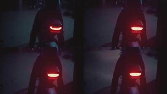 黑暗中的摩托车手高清在线视频素材下载