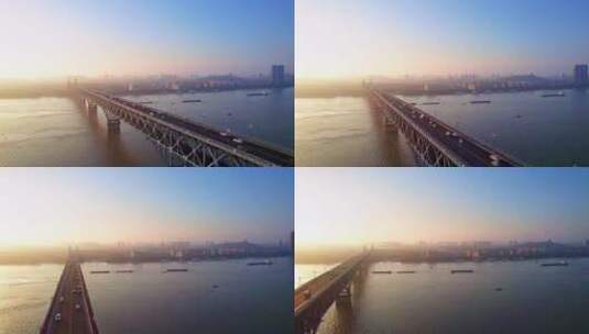 中国江苏南京长江大桥行驶的火车清晨航拍高清在线视频素材下载