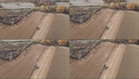 农场小麦收割机收割丰收航拍高清在线视频素材下载
