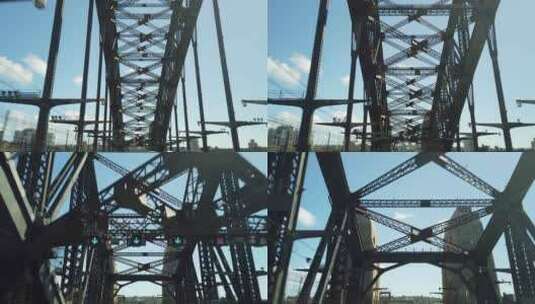 以悉尼天际线为背景，穿过悉尼海港大桥向北郊行驶高清在线视频素材下载