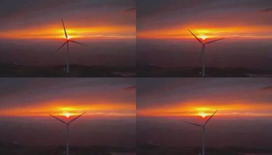 湖北利川齐岳山上夕阳与旋转的风车高清在线视频素材下载