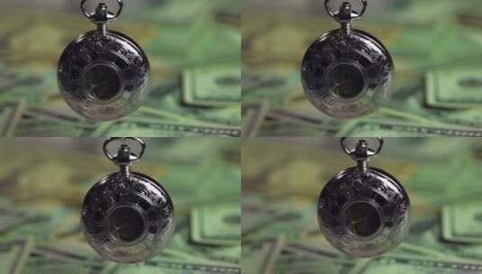 钞票上的银怀表高清在线视频素材下载