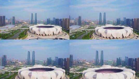 中国浙江杭州奥体中心体育场和杭州之门航拍高清在线视频素材下载