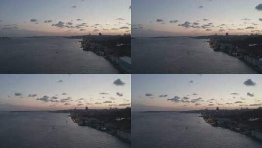 黄昏博斯普鲁斯海峡上空，橙色天空，鸟瞰高清在线视频素材下载