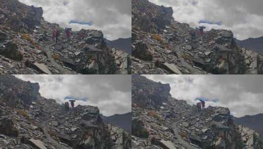 攀登横断山脉乌库楚雪山的登山者徒步进山高清在线视频素材下载