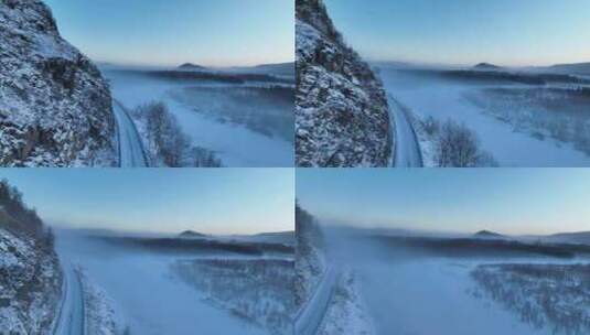 航拍林海雪原雪林冻雾和山路高清在线视频素材下载