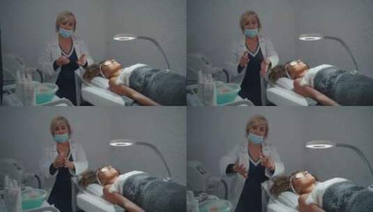 医生在沙龙美容师喷洒抗菌液时使用皮肤防腐高清在线视频素材下载