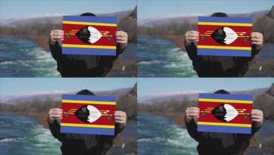 手持埃斯瓦蒂尼旗帜的人高清在线视频素材下载