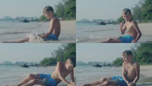 穿着蓝色短裤的男孩在海滩上玩沙子高清在线视频素材下载
