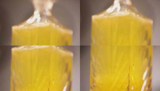 透明玻璃瓶装黄色果汁 (2)高清在线视频素材下载