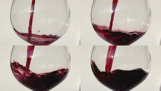 酒杯里倒入葡萄酒的慢镜头高清在线视频素材下载