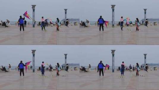 滨海广场上放风筝高清在线视频素材下载