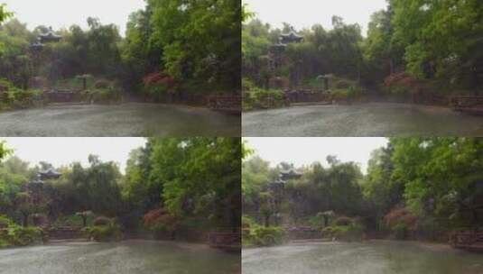 阴天小雨中的园林庭院降雨竹林雨中古建筑高清在线视频素材下载