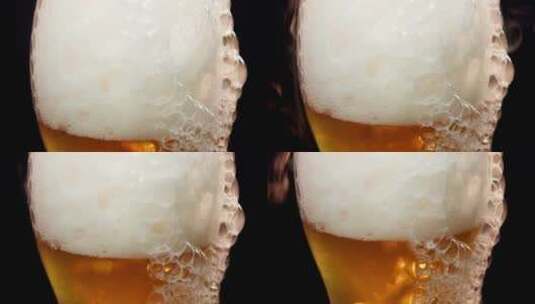 泡沫从啤酒杯里滴下来高清在线视频素材下载