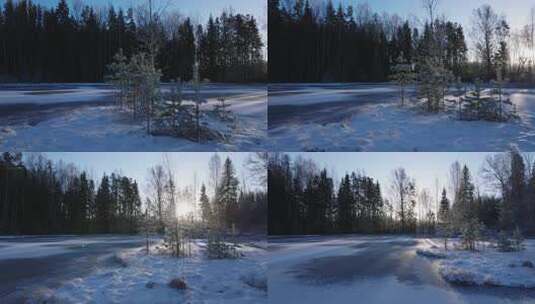 冬日森林积雪与结冰湖面高清在线视频素材下载