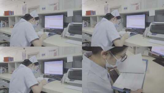 在医院做病例报告认真工作的护士高清在线视频素材下载
