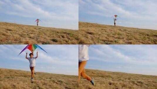 小男孩在田野里放风筝高清在线视频素材下载