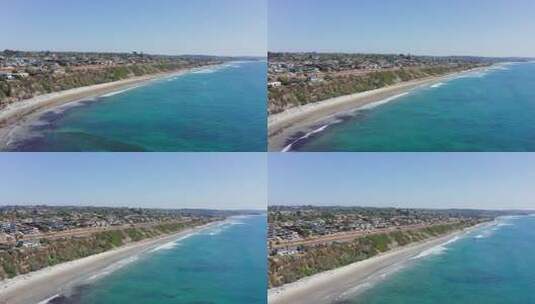 航拍沿海城市和沙滩高清在线视频素材下载