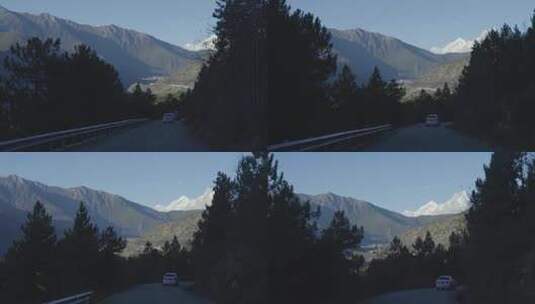 西藏派墨公路山峦汽车航拍709高清在线视频素材下载