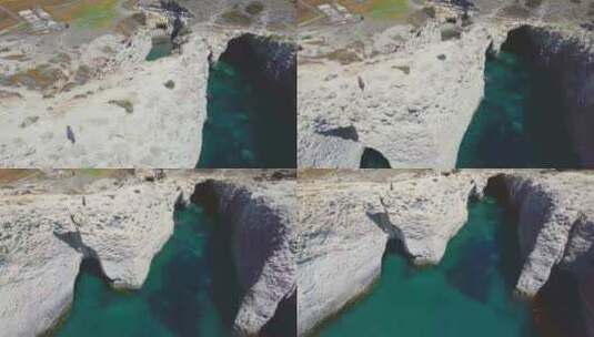希腊米洛斯帕帕弗拉加斯海滩悬崖和海滩的鸟瞰图高清在线视频素材下载