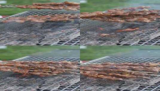 户外晒烤炉炭火羊肉串冒烟火慢动作高清在线视频素材下载